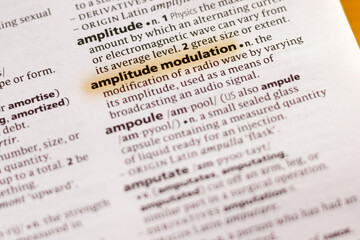 Ivanovsk, Russia - November 19, 2018: The word or phrase Amplitude Modulation in a dictionary.