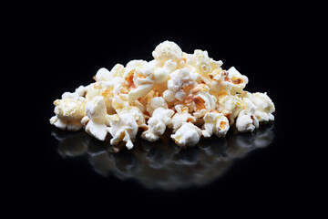 Close-up of a heap of popcorn on a black background