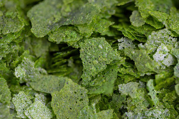 Pile of dry fish food. Macro shot. Selective focus.