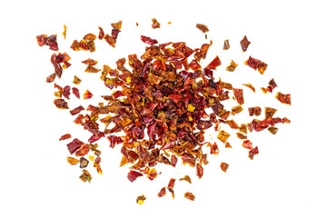 Top view of dry red chili pepper slices isolated on white background.