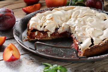 Plum cake with meringue on top