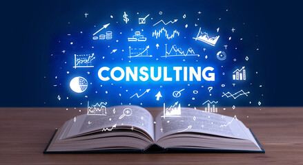 CONSULTING inscription coming out from an open book, business concept