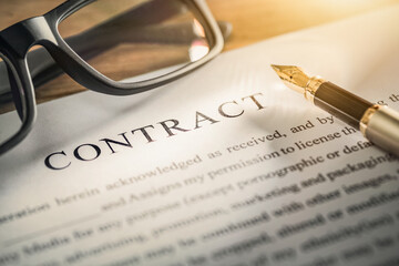 Business contract and pen.