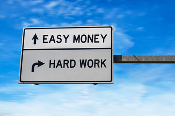 Easy money versus hard work. White two arrow road sign on metal pole.