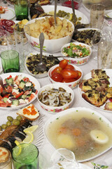 Set of different meaty and vegetable dishes. Festive dinner at home