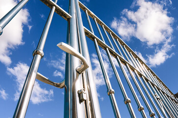 Naklejka premium Chrome fence gate. Chromium Stainless steel fence