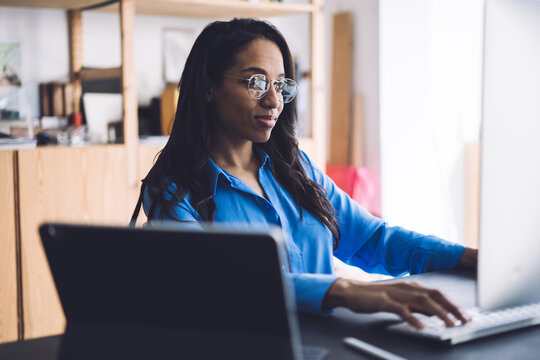 Black Woman Looking At Computer Screen