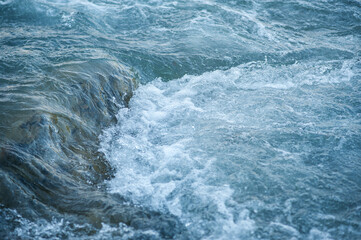 the mountain river is clean and fast