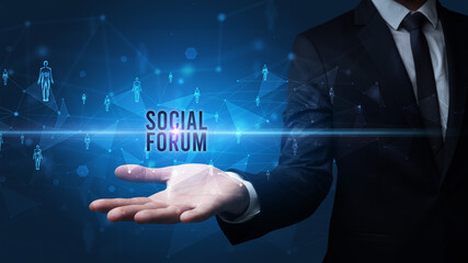 Elegant hand holding SOCIAL FORUM inscription, social networking concept