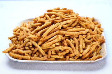 Indian snacks masala sev in white background.