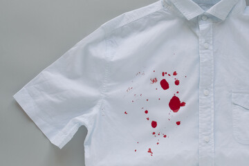 blood stains on a white shirt