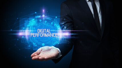 Man hand holding DIGITAL PERFORMANCE inscription, technology concept