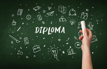 Hand drawing DIPLOMA inscription with white chalk on blackboard, education concept
