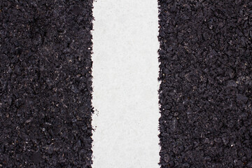Asphalt texture background with white line