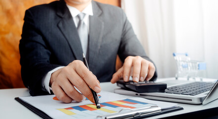 businesswoman hand using smart phone,mobile p payments online shopping,omni channel,digital tablet docking keyboard computer at office in sun light