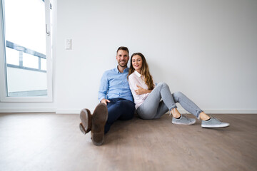 Young Happy Couple Thinking And Dreaming