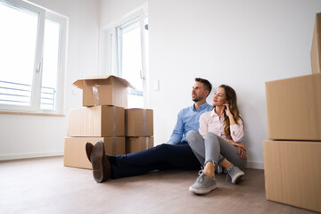 Couple Moving Into New House