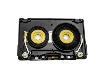 old audio cassette tape open on white background