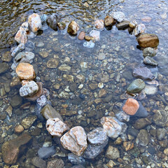 stone hear in shallow water