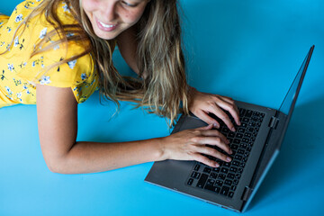 girl with laptop smiling