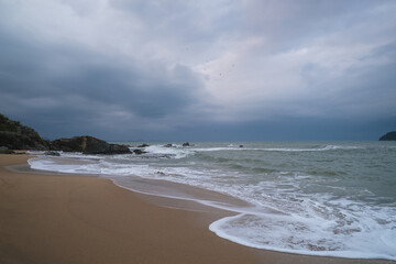 clouds over the sea rocks 
