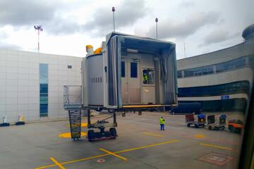 Naklejka premium The delivery of a telescopic ladder to the aircraft for the exit of passengers.