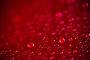 Red aluminum can with water drops or dew close-up macro shot