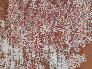 Texture of cracked paint on a white wall. Background image