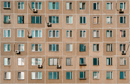 Panel building in Russia, Soviet architecture houses. Russian old urban residential houses with windows
