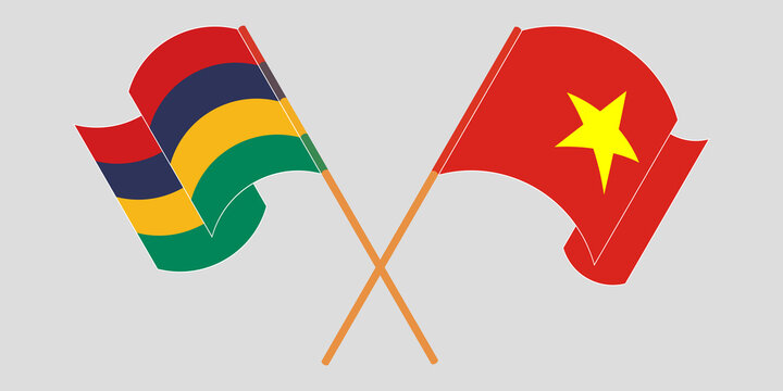 Crossed and waving flags of Mauritius and Vietnam