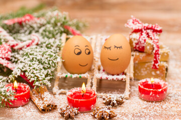 Fototapeta na wymiar funny eggs, Christmas, mandarin, gift and candles