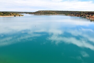 Blue waters of the Peñarroya reservoir, Ruidera lagoons.