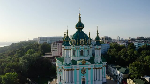 Orthodox Church on green hill in the city Kyiv, Ukraine. Aerial View of St. Andrews Church in the morning