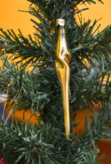 Fototapeta premium Sucker, an old Christmas tree toy of the Soviet era hangs on a Christmas tree