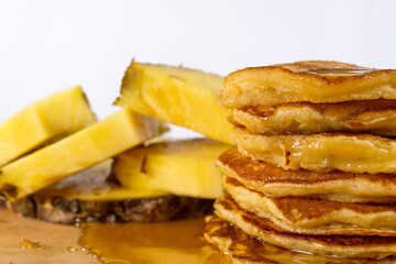 Delicious pancakes on a wooden table