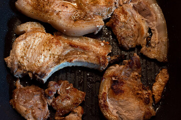 Juicy meat steak on pan, close-up. Selective focus.