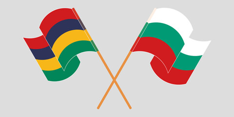 Crossed and waving flags of Mauritius and Bulgaria