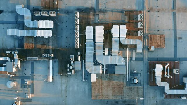 Aerial top down view of the ventilation and air conditioning systems installed on the rooftop