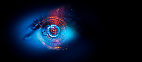 Close-up biometric scan of a female eye. The concept of modern virtual reality. Neon light, cyber background.
