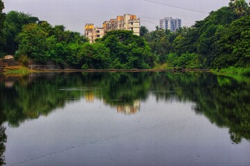 Fototapeta na wymiar Reflection of Nature in Still water
