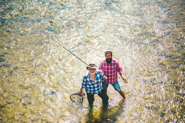 Elegant bearded men fishing. Relax in natural environment. Off limits fishing. Happy fishermen friendship. Fishman crocheted spin into the river waiting big fish. Man catching fish.