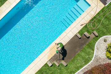 Residential Backyard Garden with Pool New Natural Grass Installation - obrazy, fototapety, plakaty