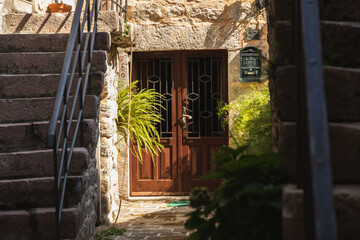 Cozy nook in the old town of budva, montenegro, stairs and doors