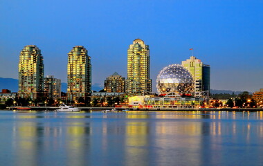 Fototapeta na wymiar Science World Museum at night illuminated by the last rays of the setting sun, Vancouver Harbor, Vancouver City, Downtown