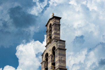 A dark and depressing chapel against a stormy sky