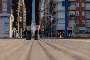 woman and men feet on the street, concept of couple, unity, city campaign, couple advertising