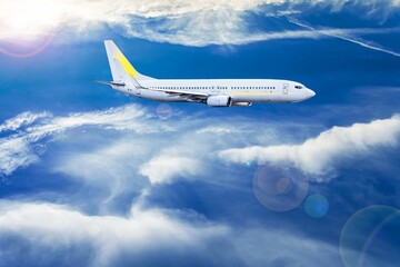 Naklejka na ściany i meble Airplane in the sky - Passenger Airliner