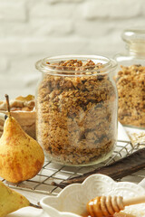 Healthy and easy homemade granola in a jar. Serie of photos.
