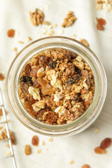 Healthy and easy homemade granola in a jar. Serie of photos.
