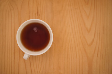 cup of tea on wooden table